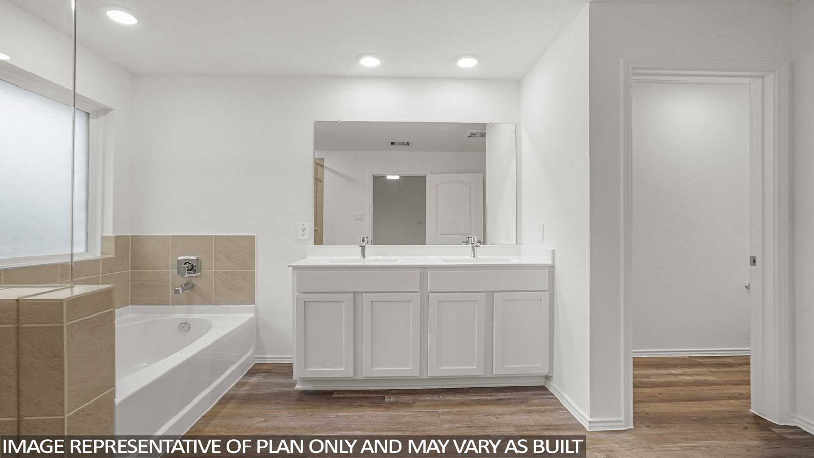 Primary bathroom with dual sinks, shower, tub, white walls, and vinyl wood flooring.
