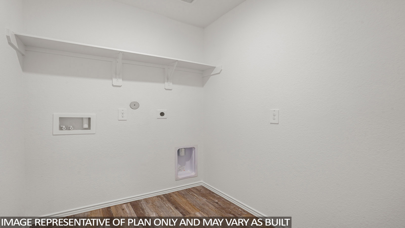 Laundry room with white walls and vinyl wood flooring.
