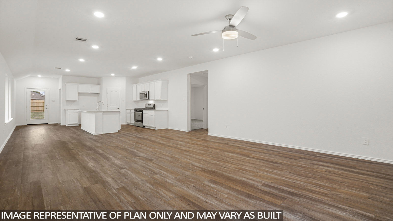 Open living room with windows, white walls, and vinyl wood flooring.