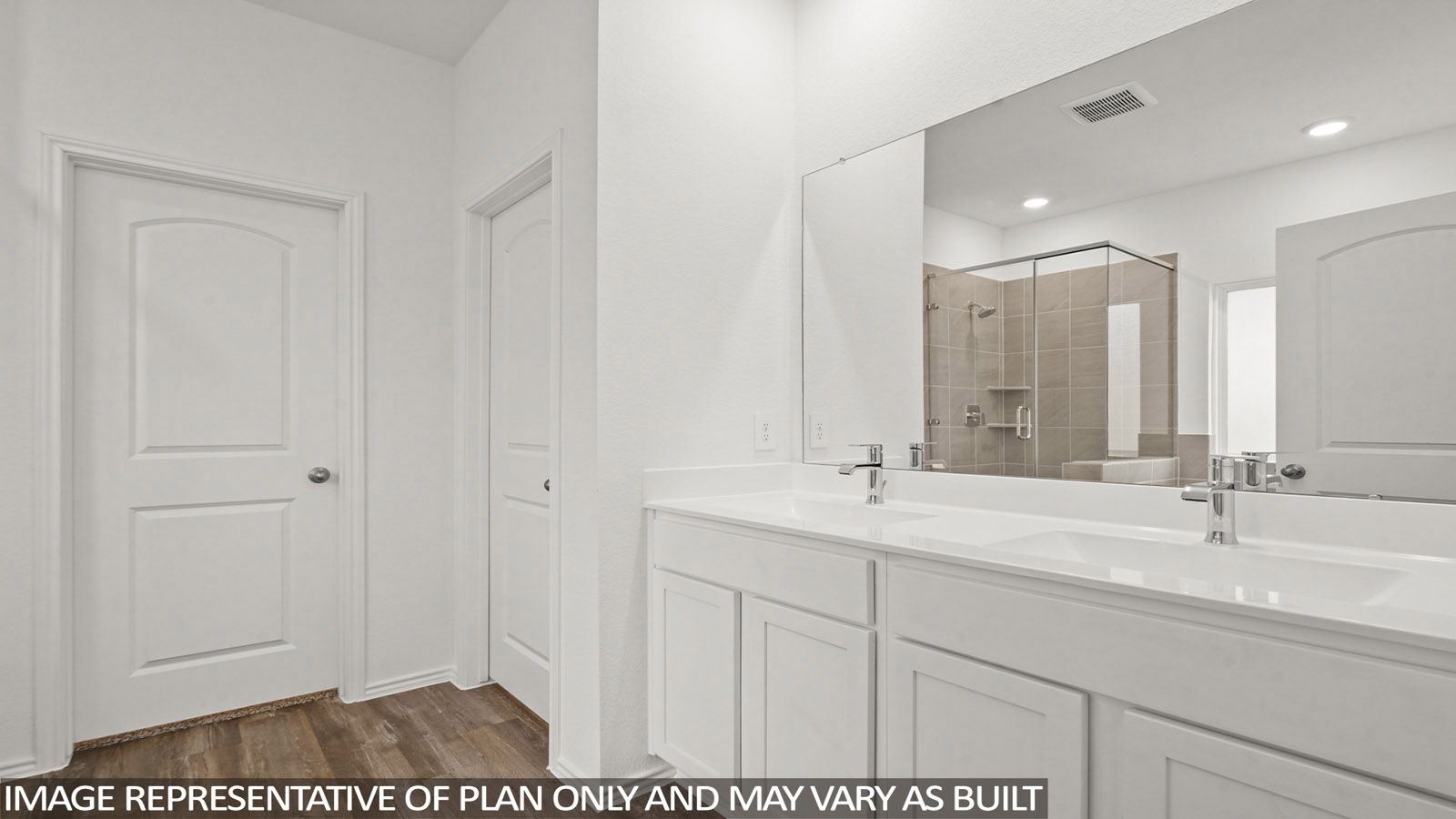 Owner’s ensuite in a D.R. Horton new build home offers function and style with a walk-in closet, spa-like ensuite