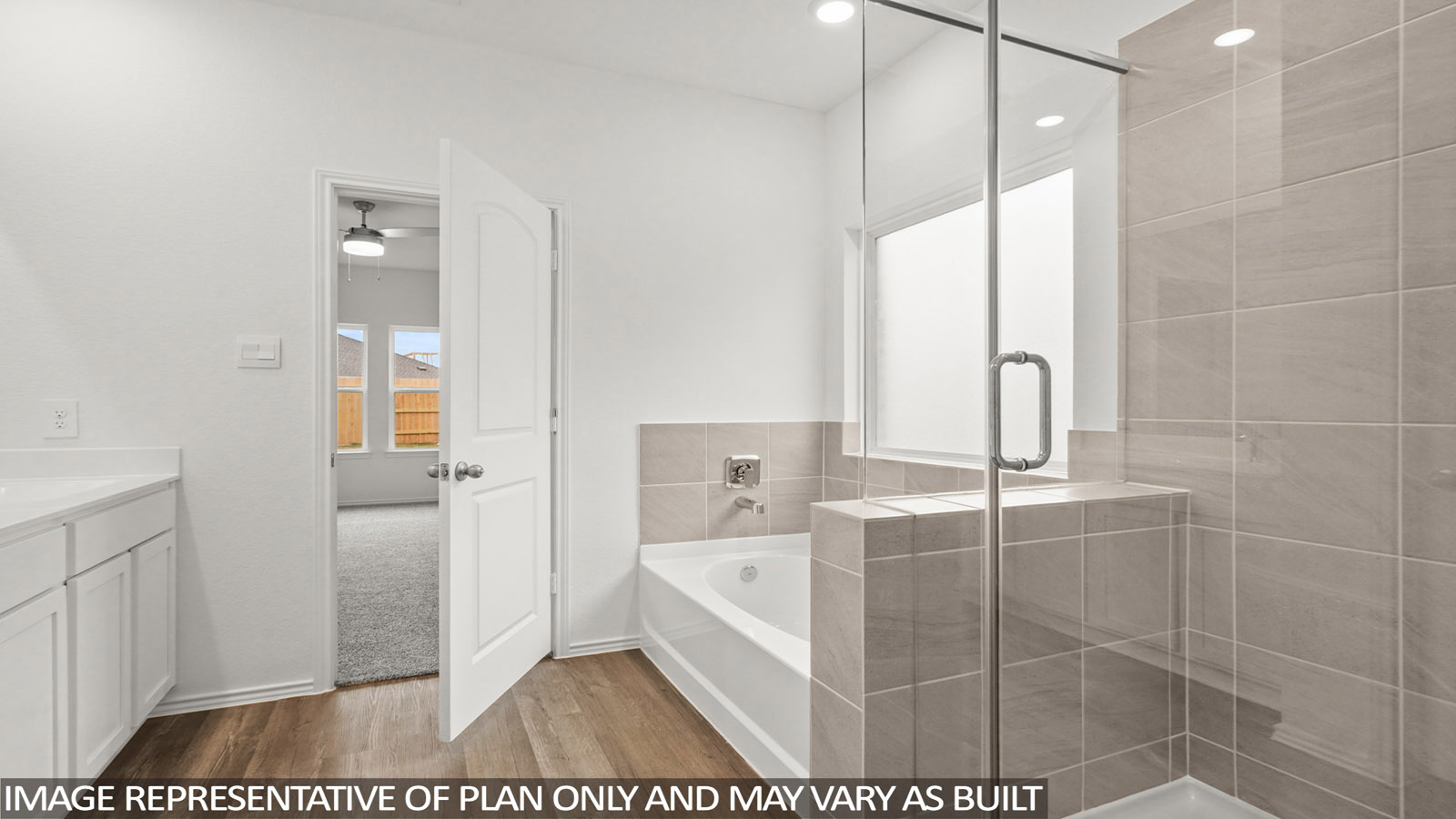 New build home adds a thoughtful private ensuite, walk-in shower, walk-in closet, full vanity, mirror, backyard views