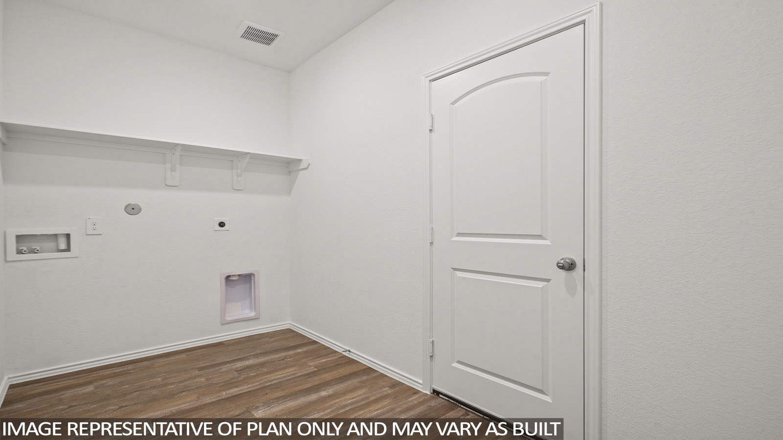 Laundry room with white walls and vinyl wood flooring.