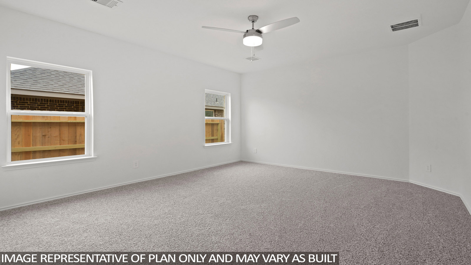 Owner’s suite offers natural window light, spa-inspired ensuite bathroom, backyard view, walk-in closet for everyday style