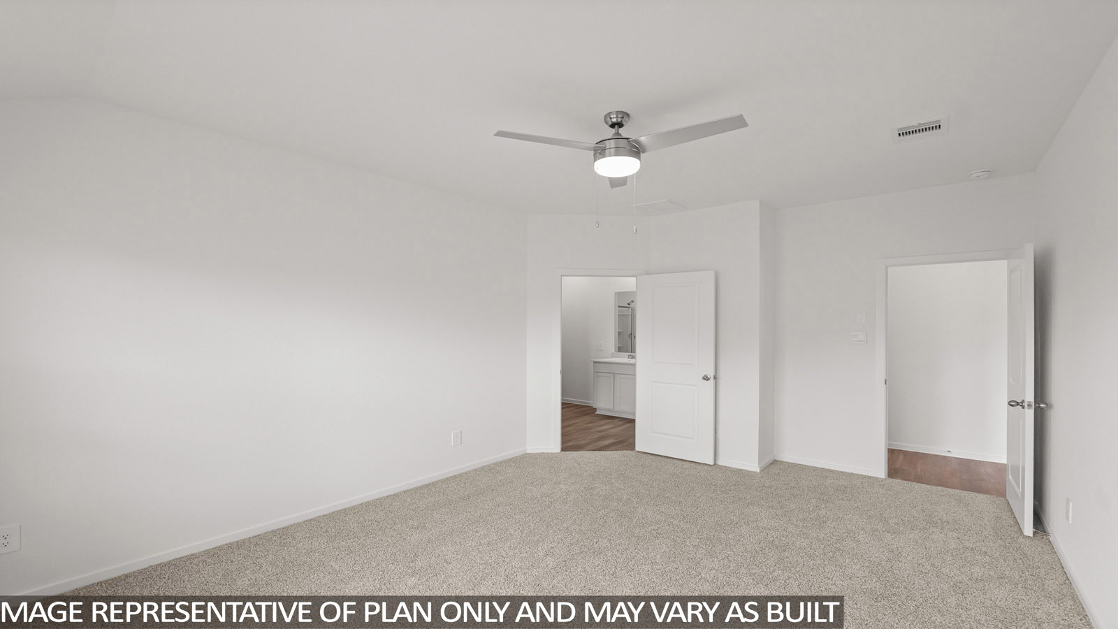 Primary bedroom with carpet flooring
