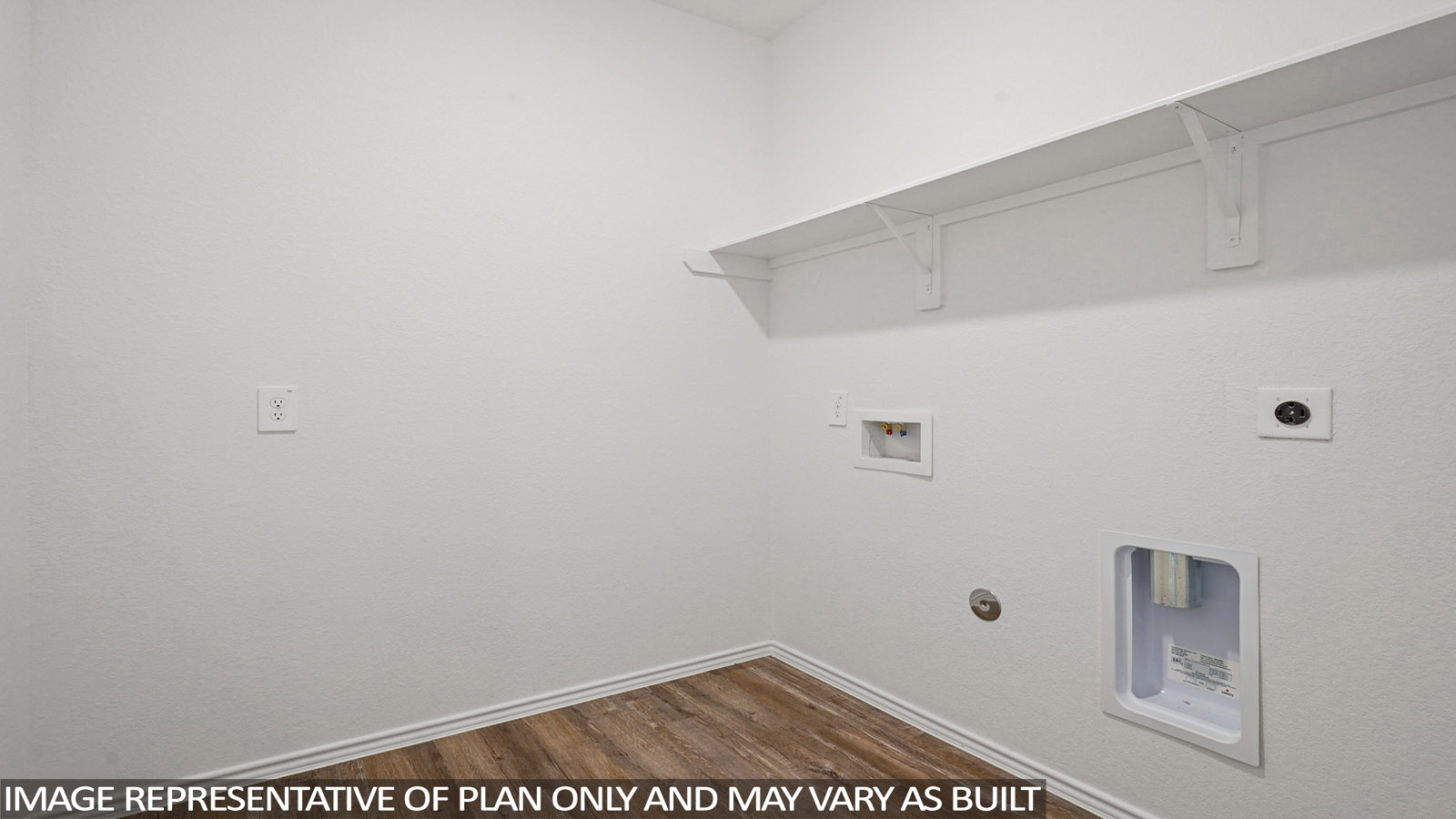 Laundry room with white walls and vinyl wood flooring.