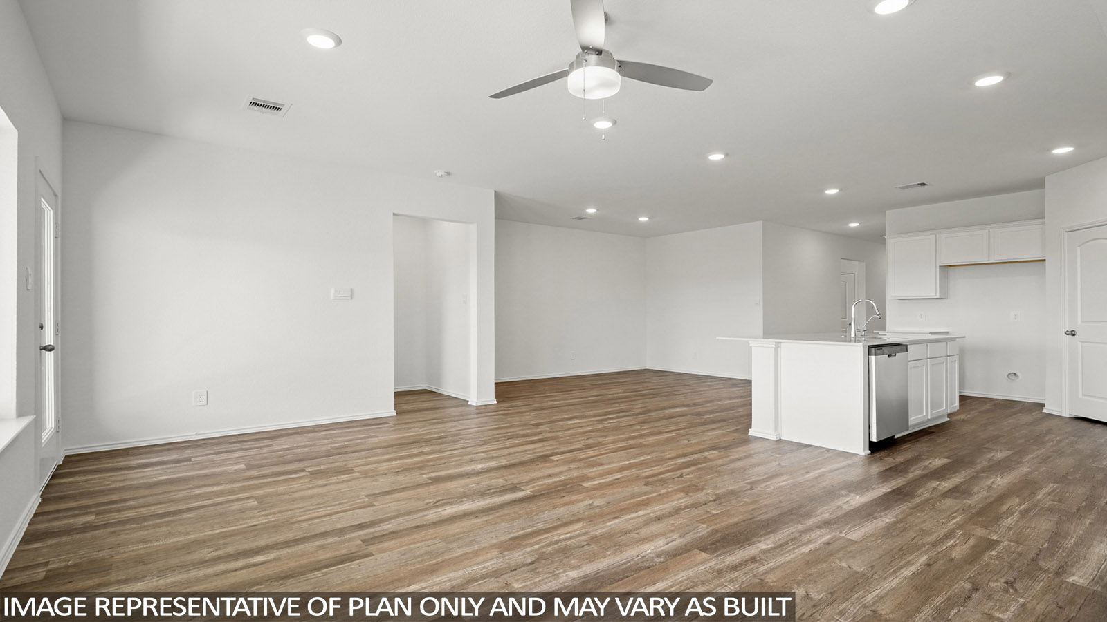 Open living room with windows, white walls, and vinyl wood flooring.