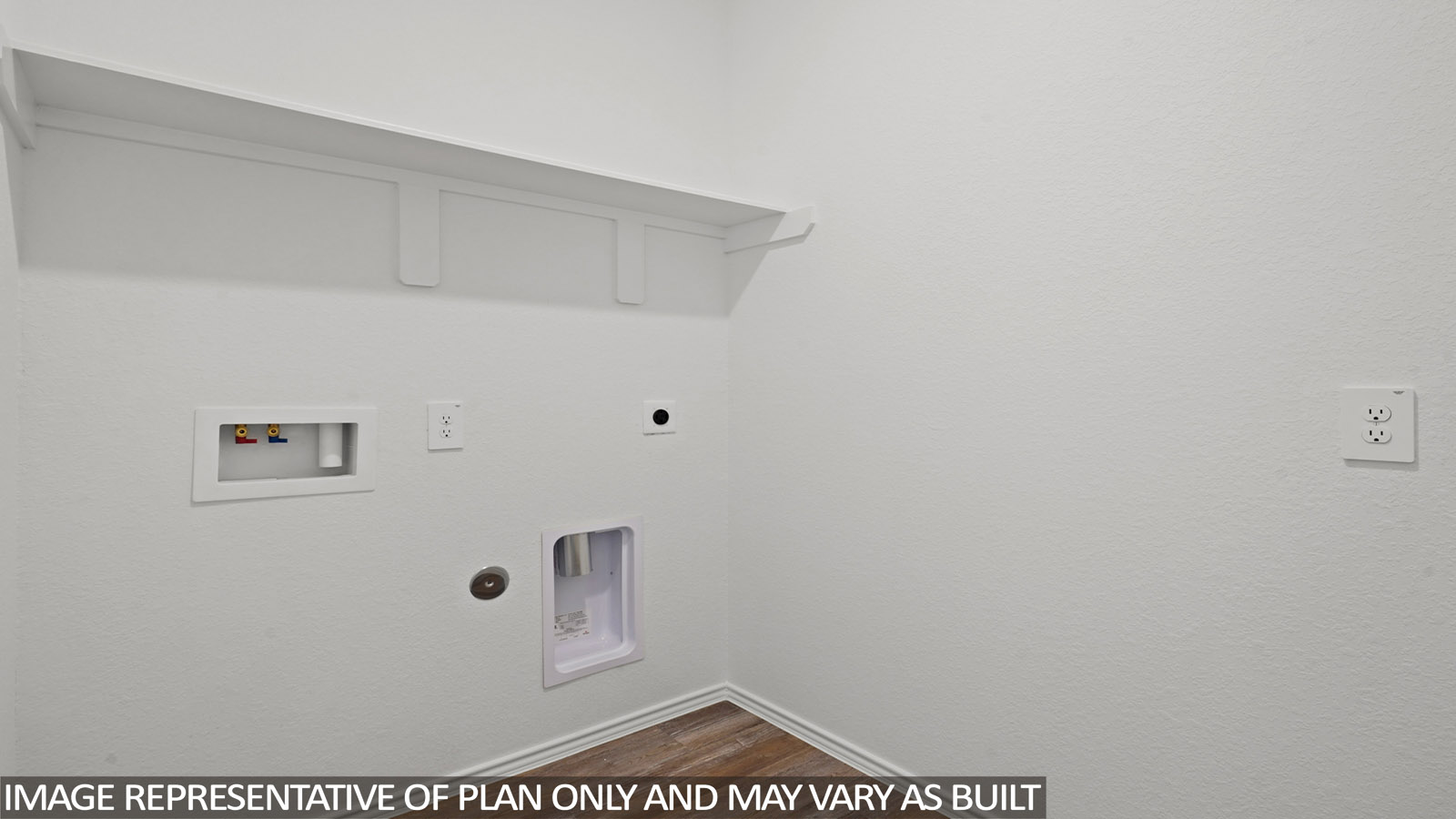 Laundry room with white walls and vinyl wood flooring.