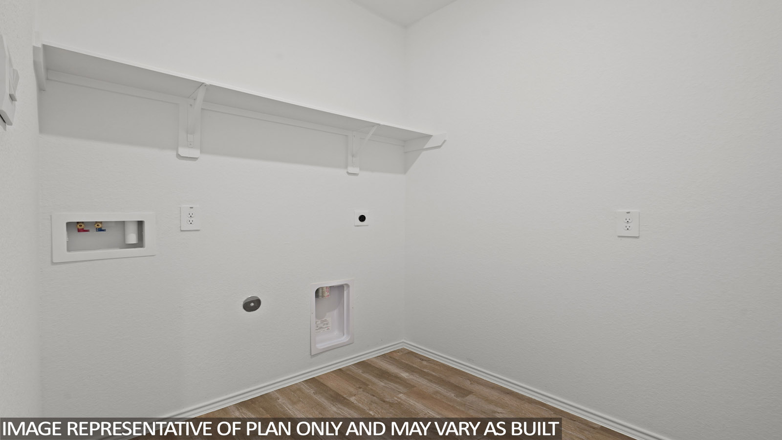 Laundry room with white walls and vinyl wood flooring.