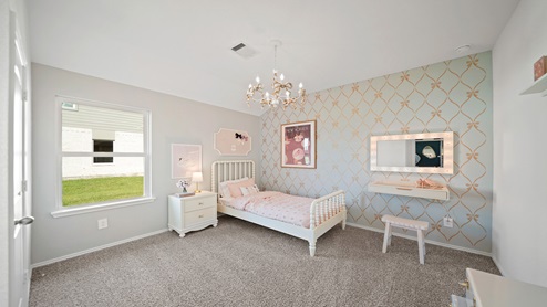 Secondary bedroom with windows, white walls, and light carpet.