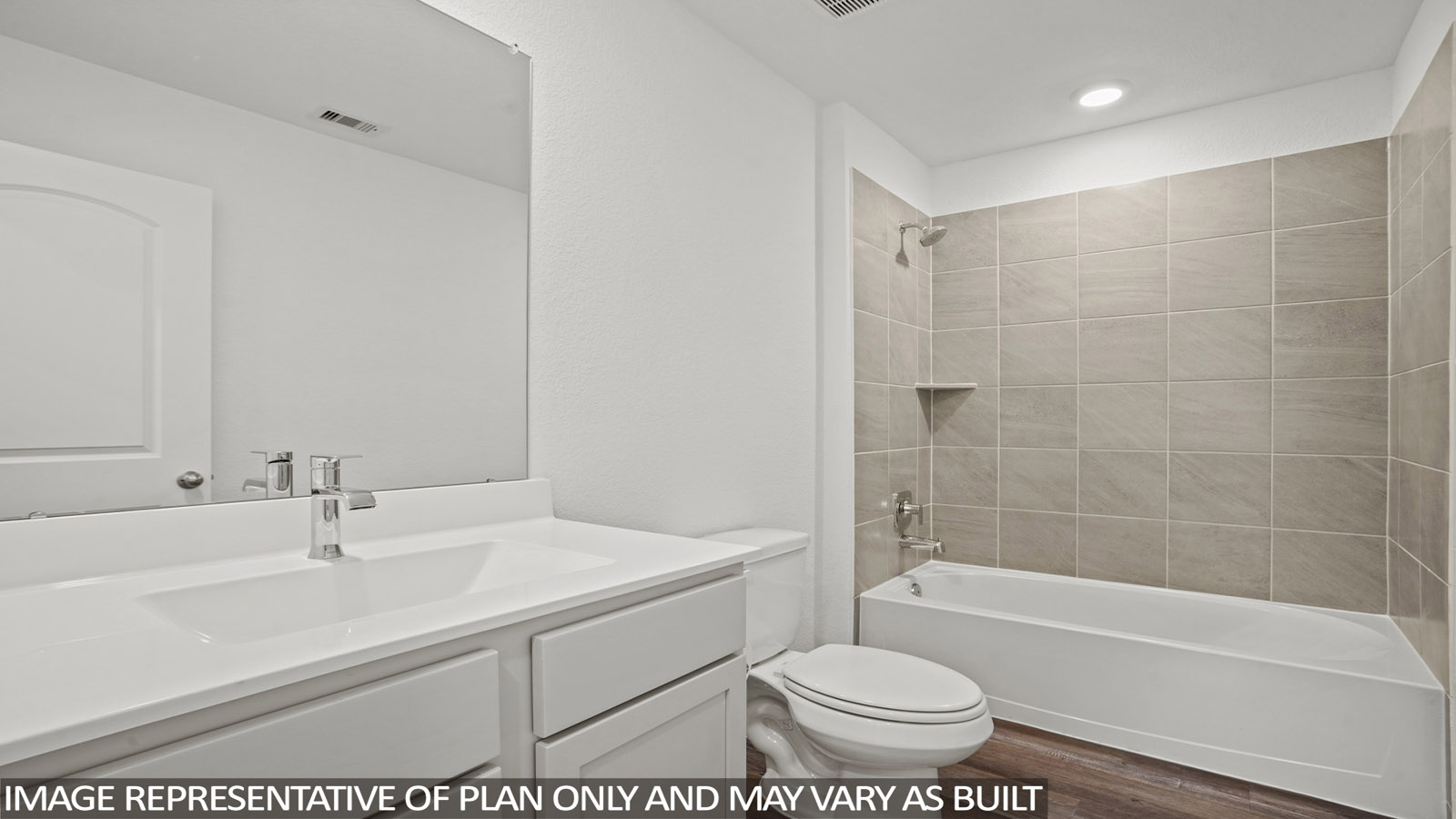 Secondary bathroom with a shower and tub combo, white walls, and vinyl wood flooring.
