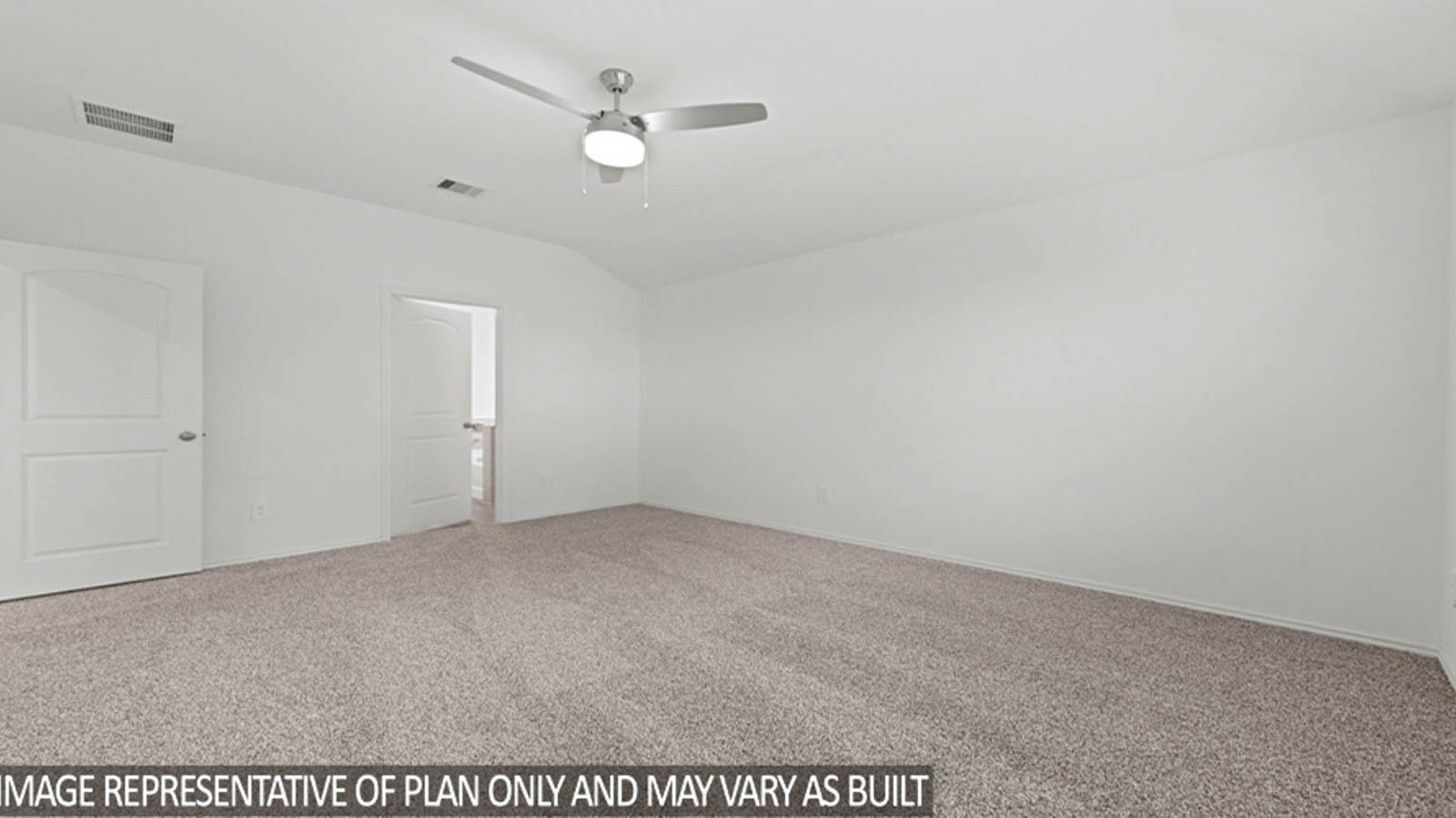 Primary bedroom with white walls, windows, and light carpet.