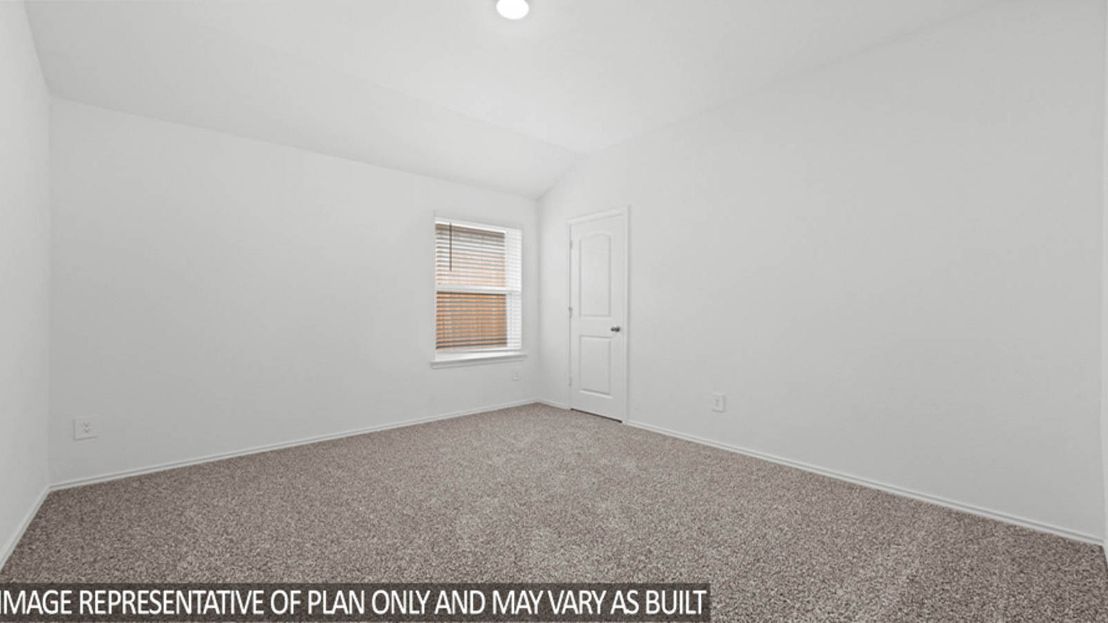 Secondary bedroom with white walls, windows, and light carpet.
