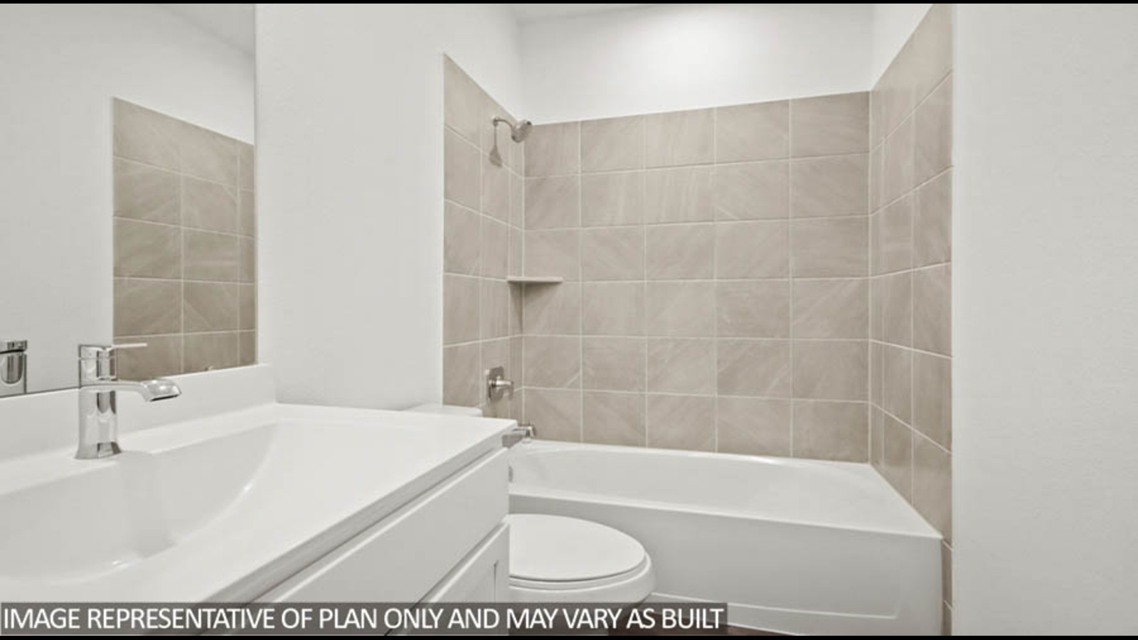 Secondary bathroom with a shower and tub combo, toilet, sink, white walls, and vinyl wood flooring.