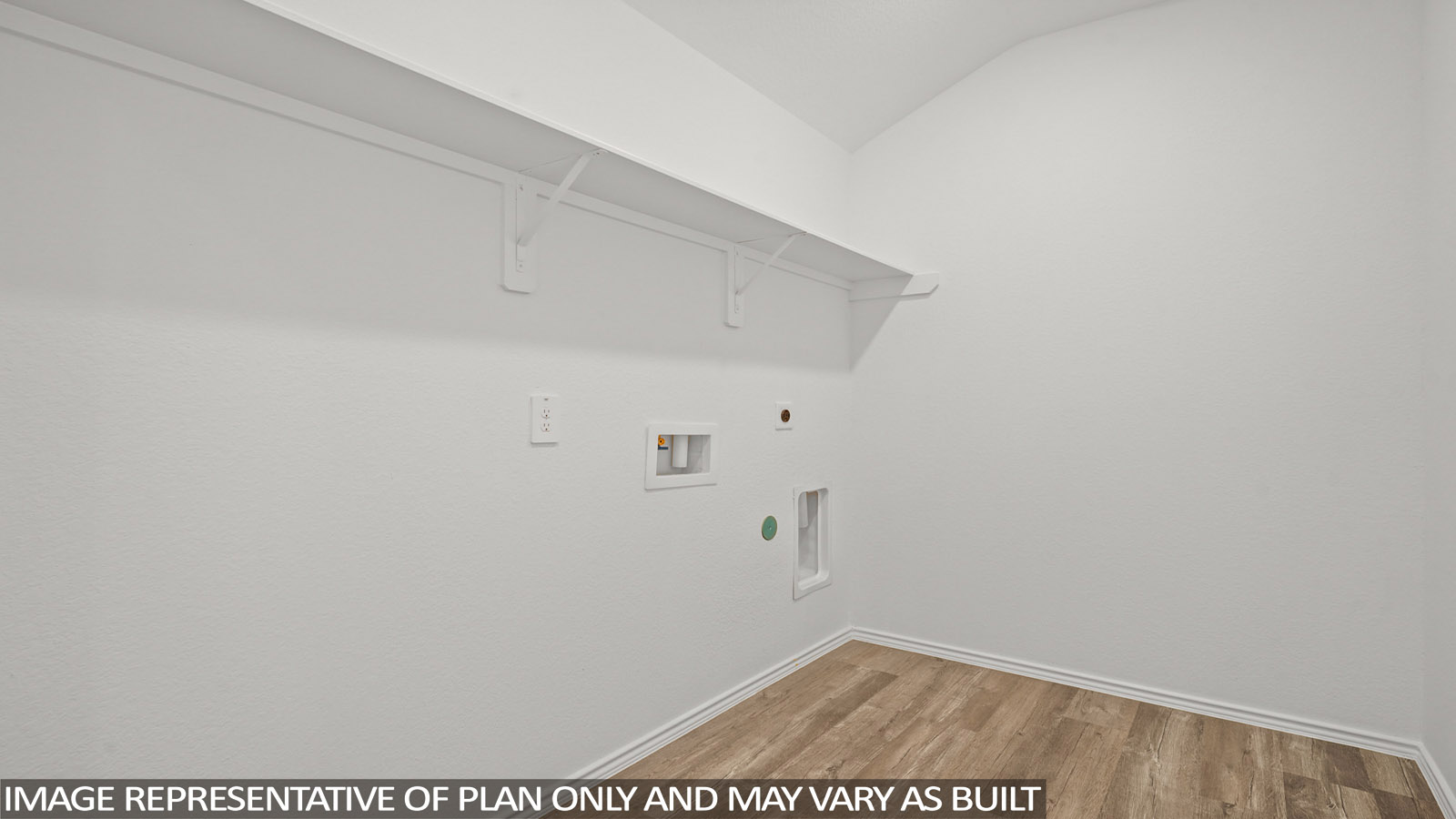 Laundry room with white walls and vinyl wood flooring.