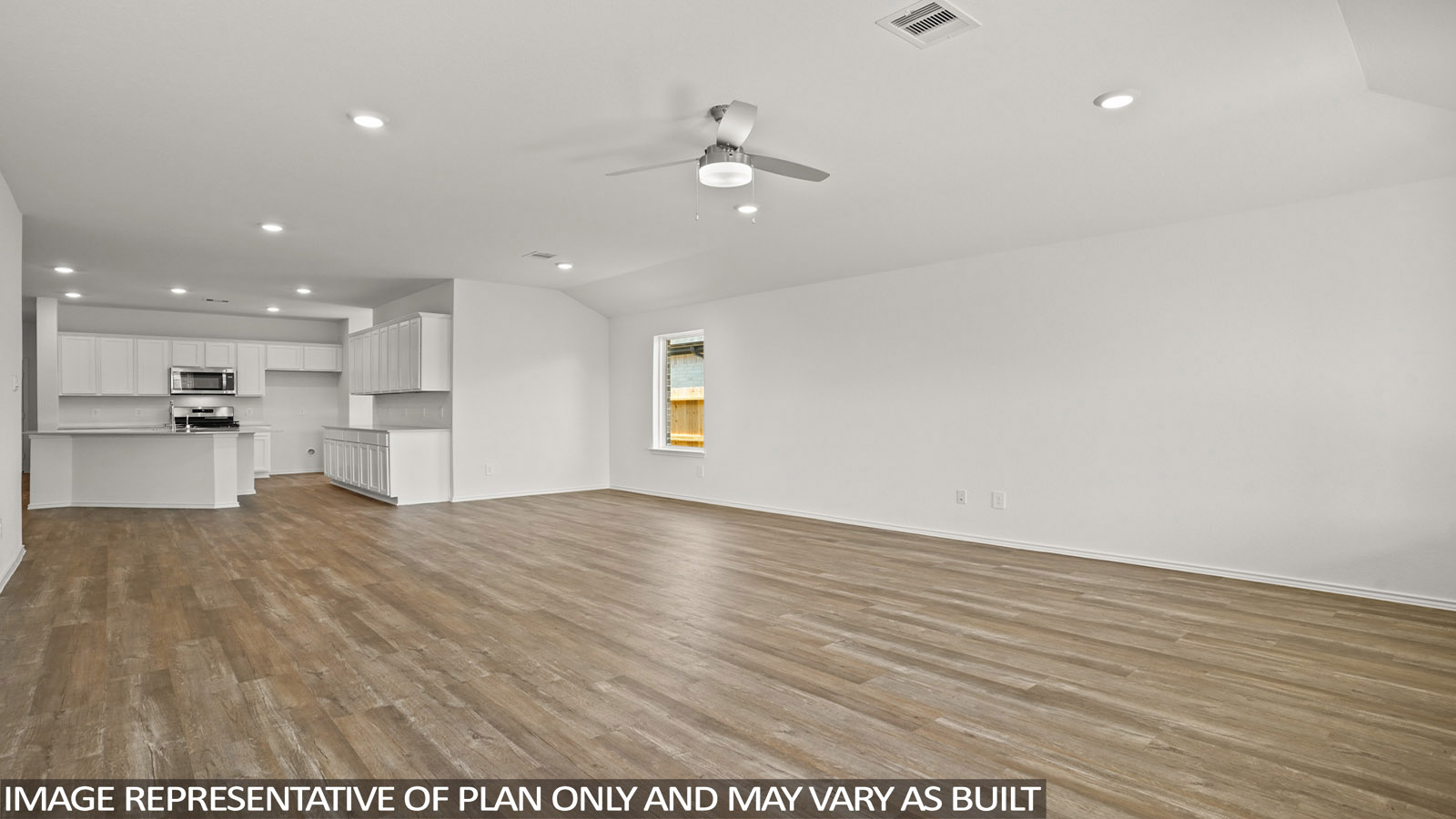 Open living room with windows, white walls, and vinyl wood flooring.