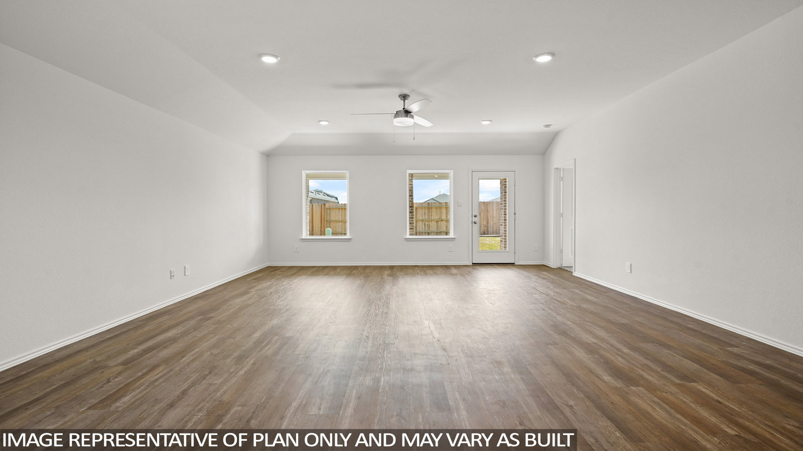 Open living room with windows, white walls, and vinyl wood flooring.