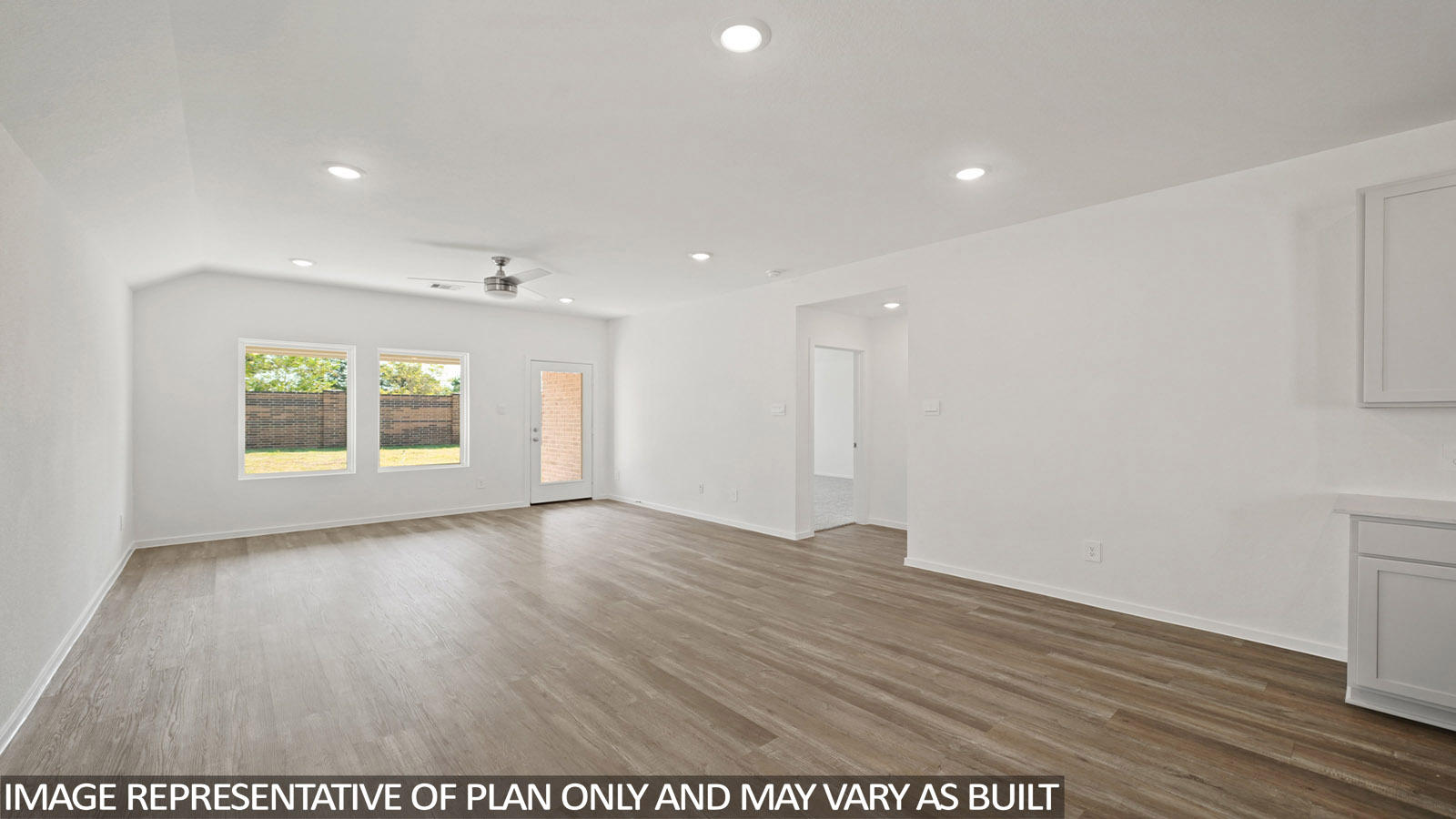 open concept living and dining area with vinyl flooring, large windows, and vinyl flooring