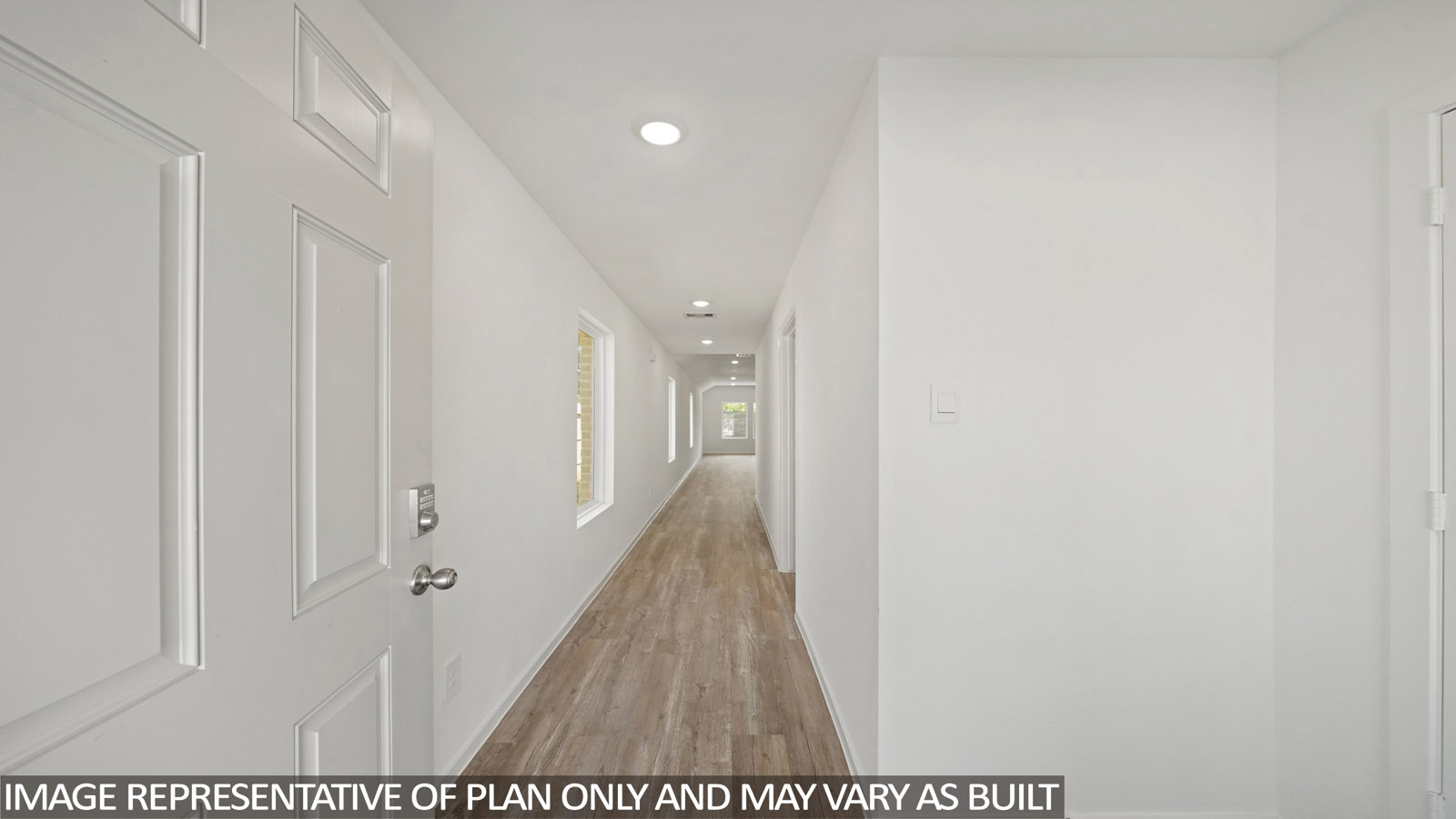 hallway with vinyl flooring