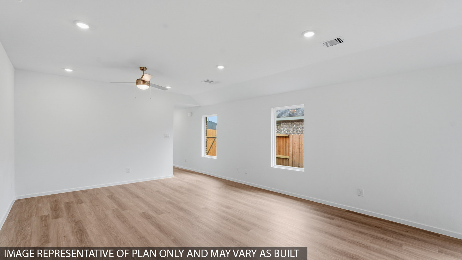 open concept living and dining area with vinyl flooring and large windows