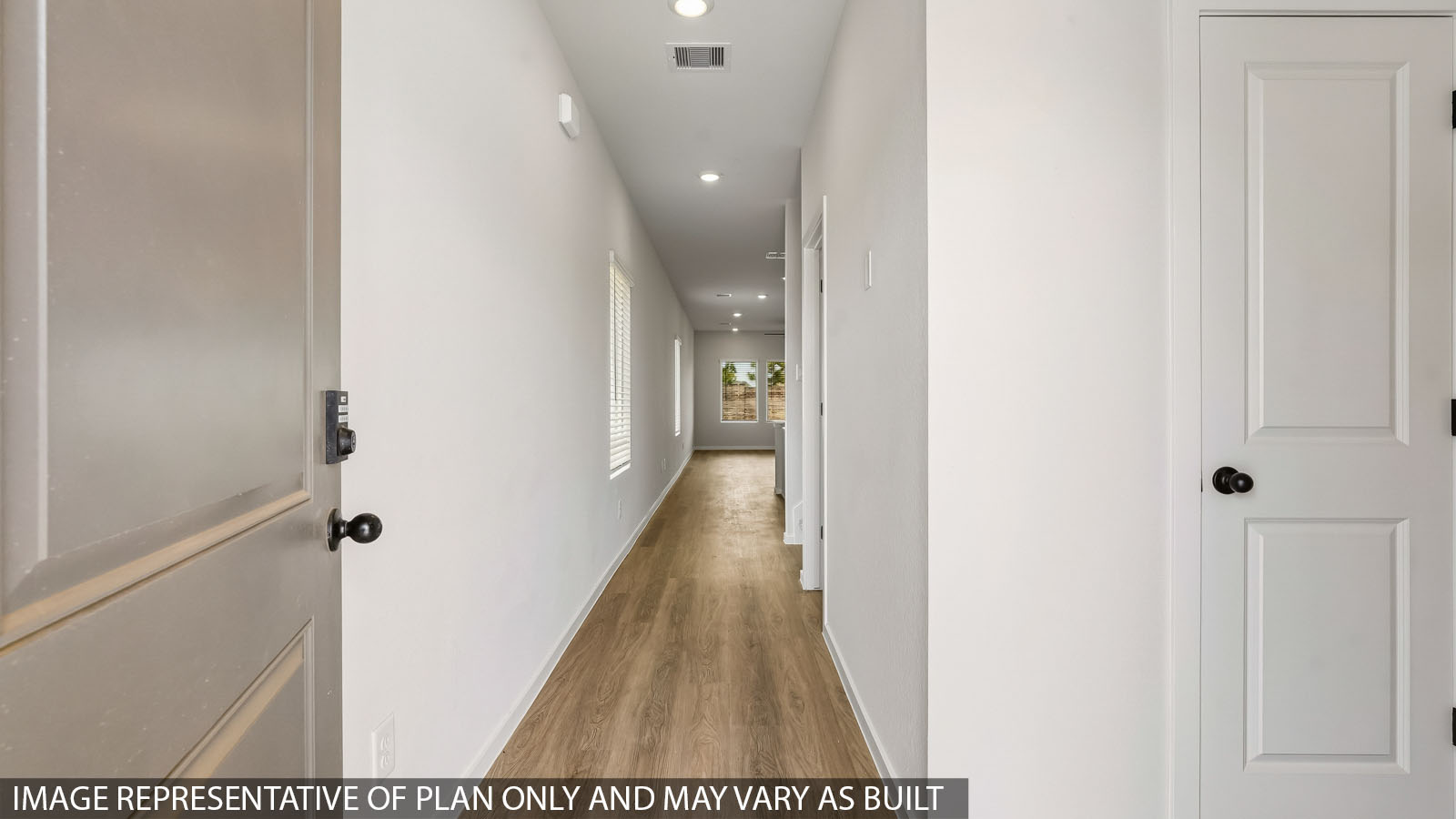 hallway with vinyl flooring