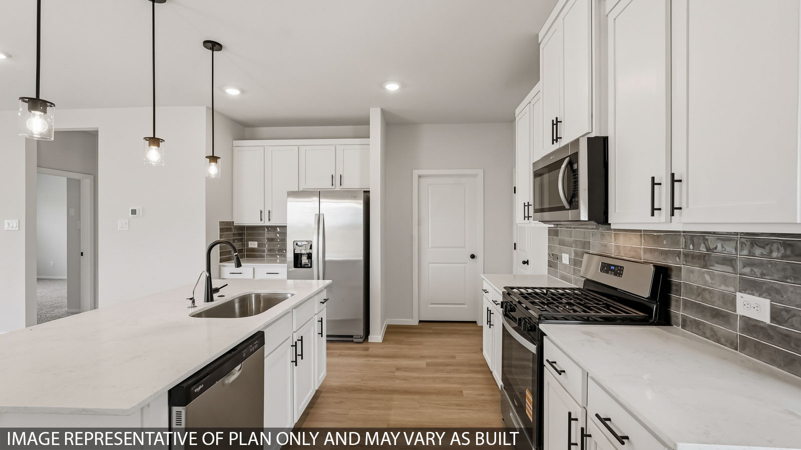 kitchen with quartz countertops and stainless steel appliances