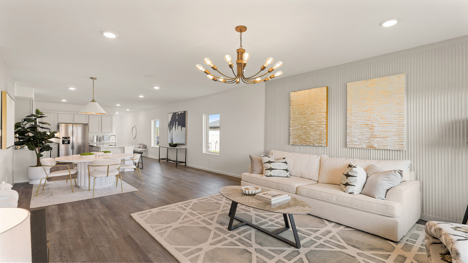 open concept living and dining area with vinyl flooring, quartz countertops, and large windows