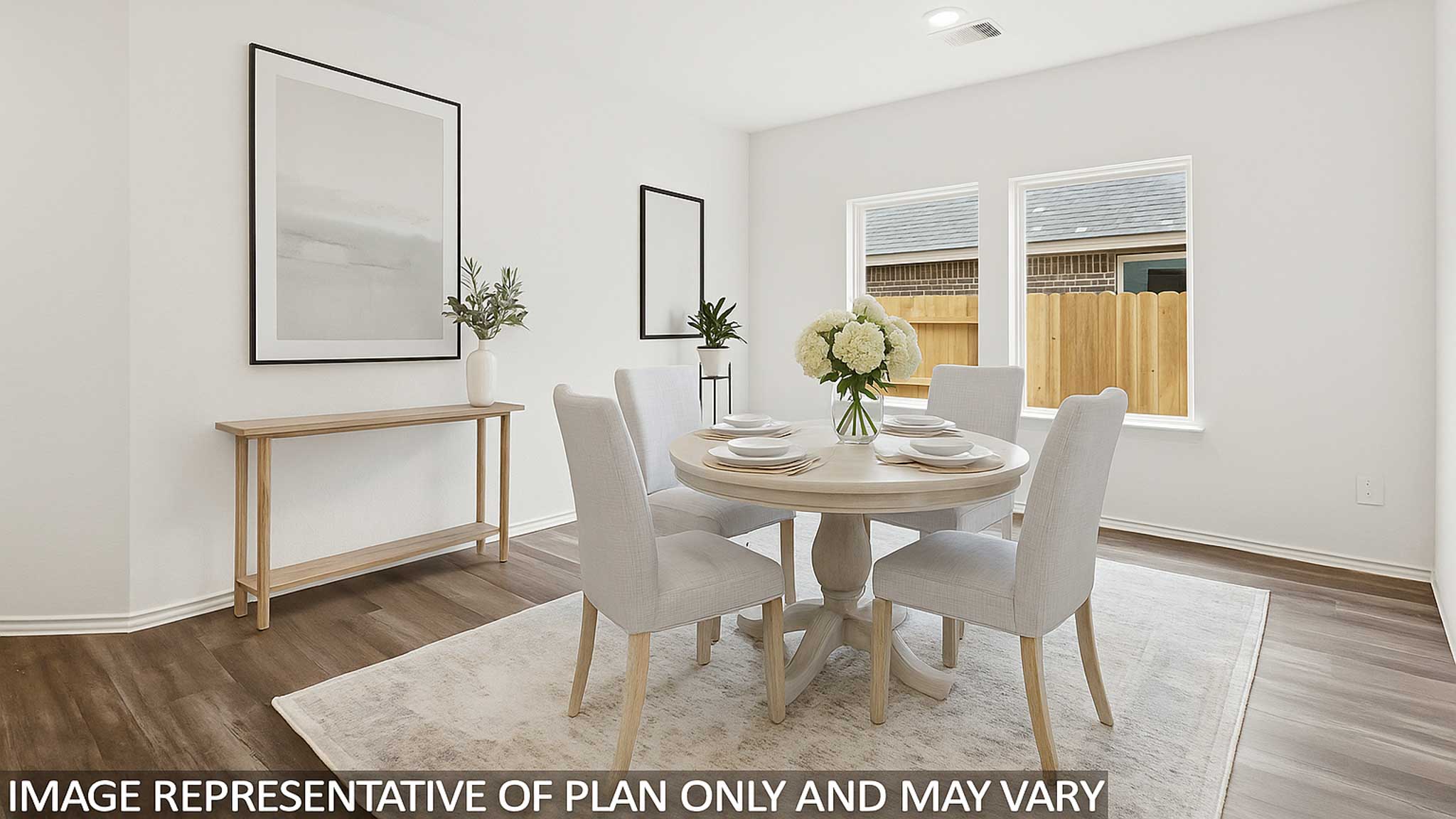 open concept livving and dining area with vinyl flooring, quartz countertops, and large windows