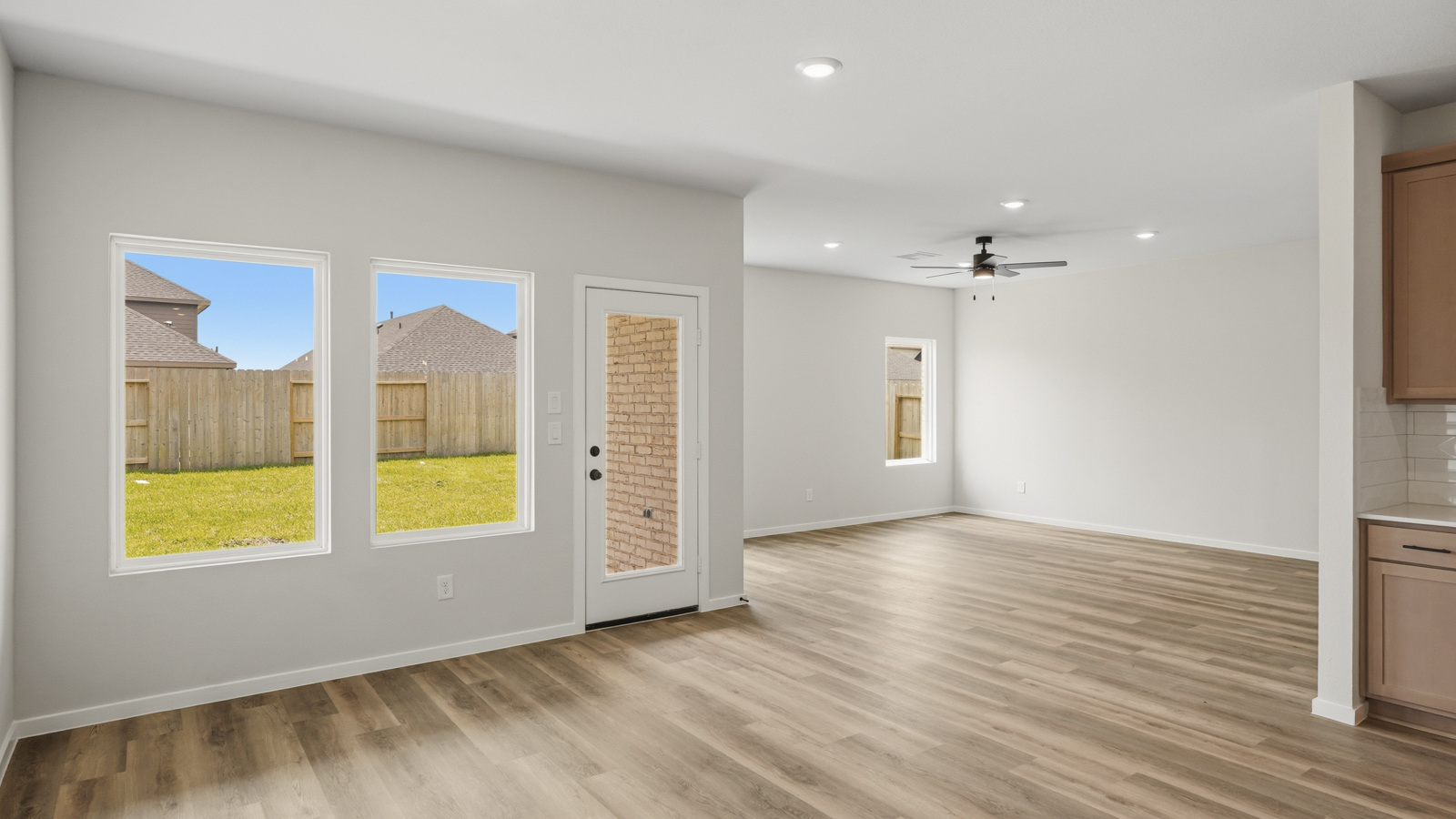 open concept living area with vinyl flooring
