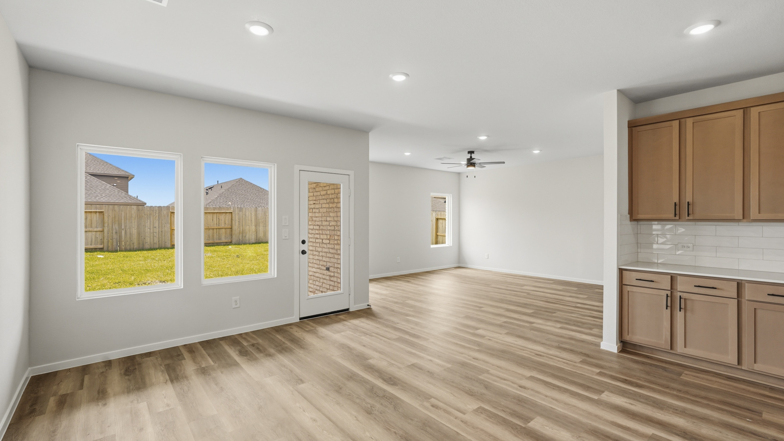 open concept living area with vinyl flooring