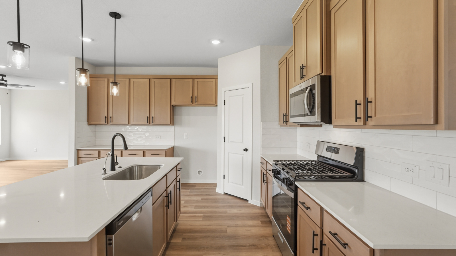 kitchen with quartz contertops and stainless steel appliances