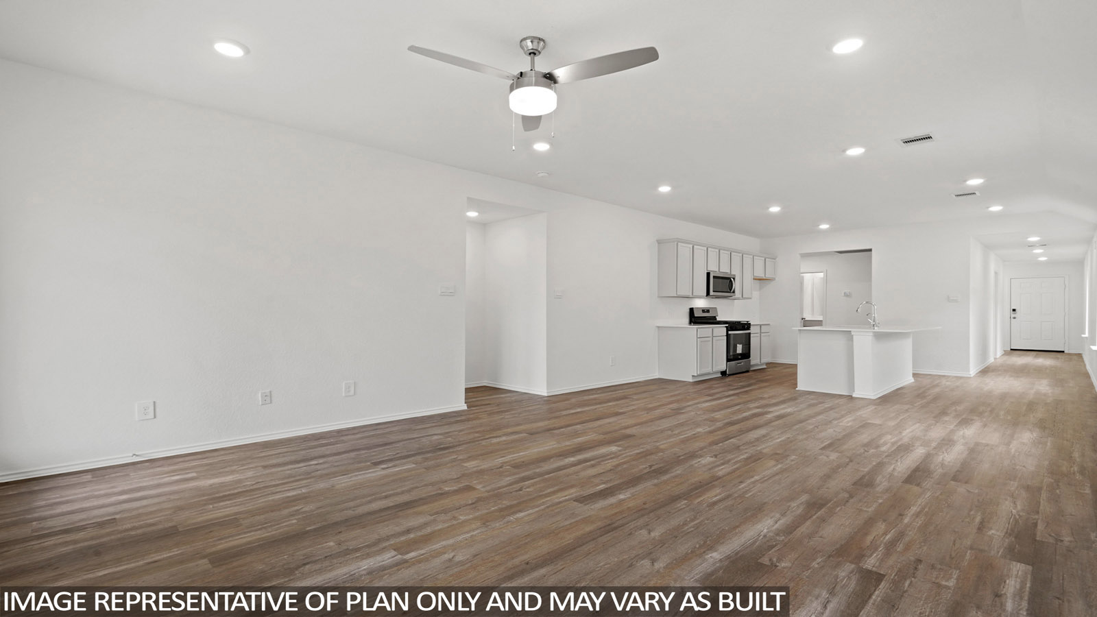open concept living and dining area with vinyl flooring, quartz countertops, and large windows