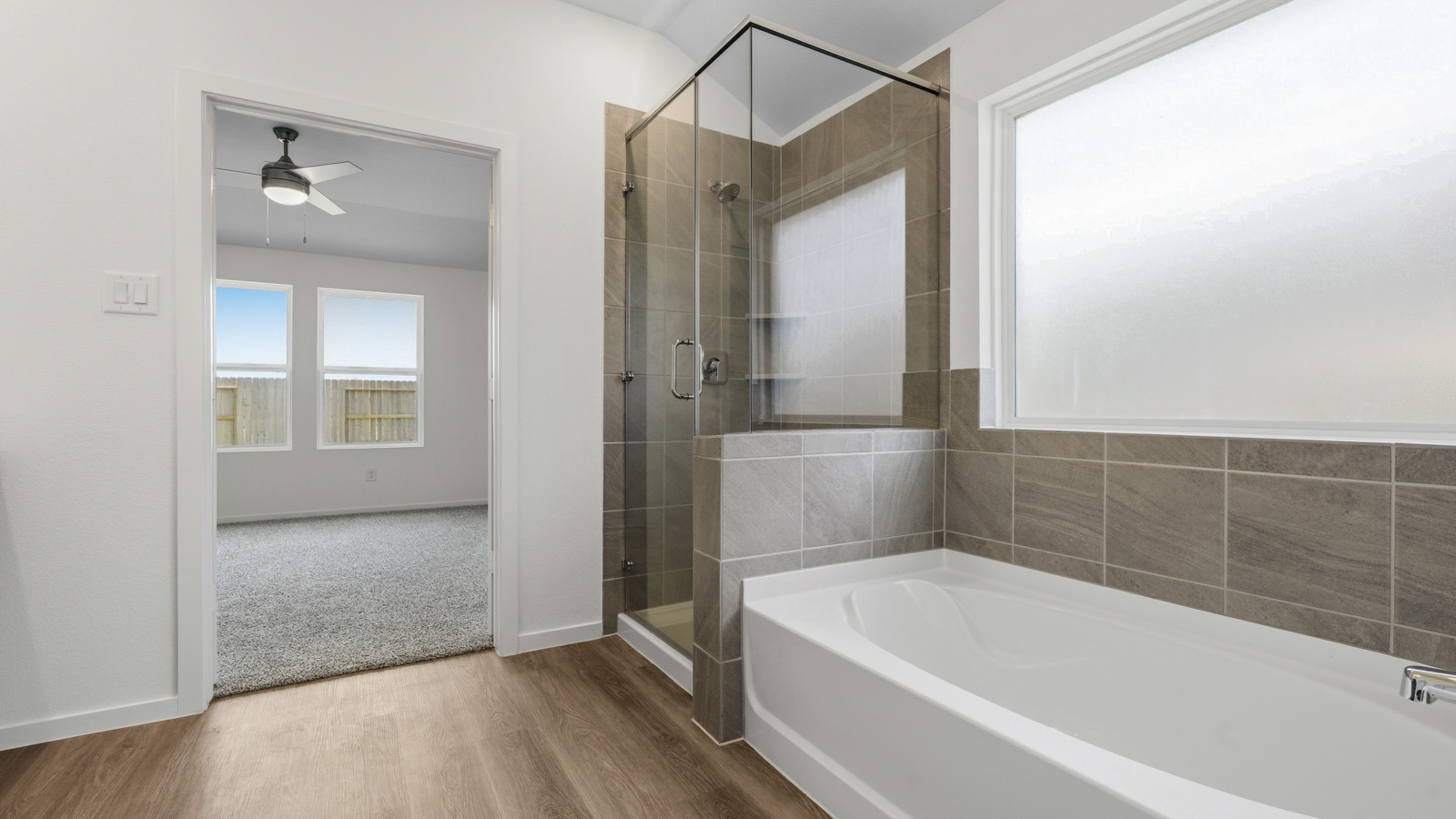 primary bathroom with seperate tub and shower in Hockley, Tx