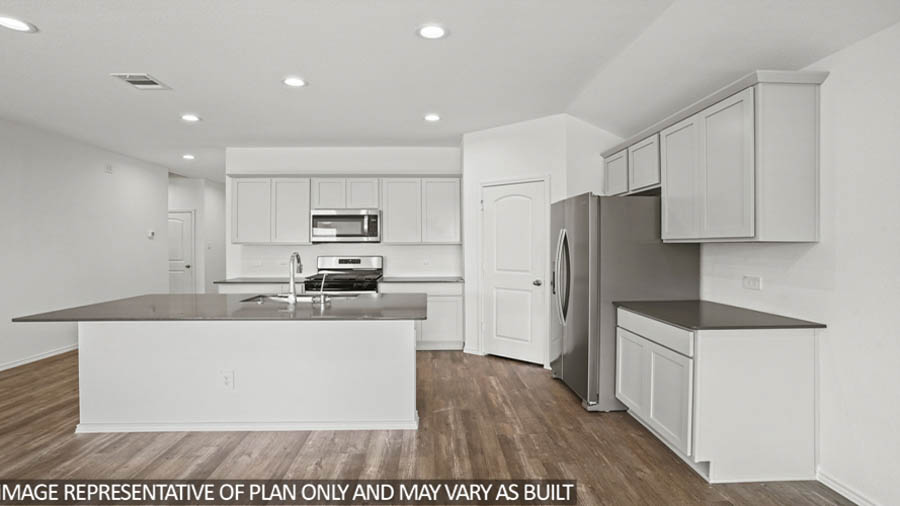 open concept livin area with vinyl flooring, large windows, and quartz countertops