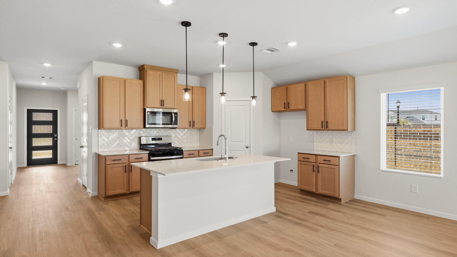 kitchen with quartz countertops and stainless steel appliances