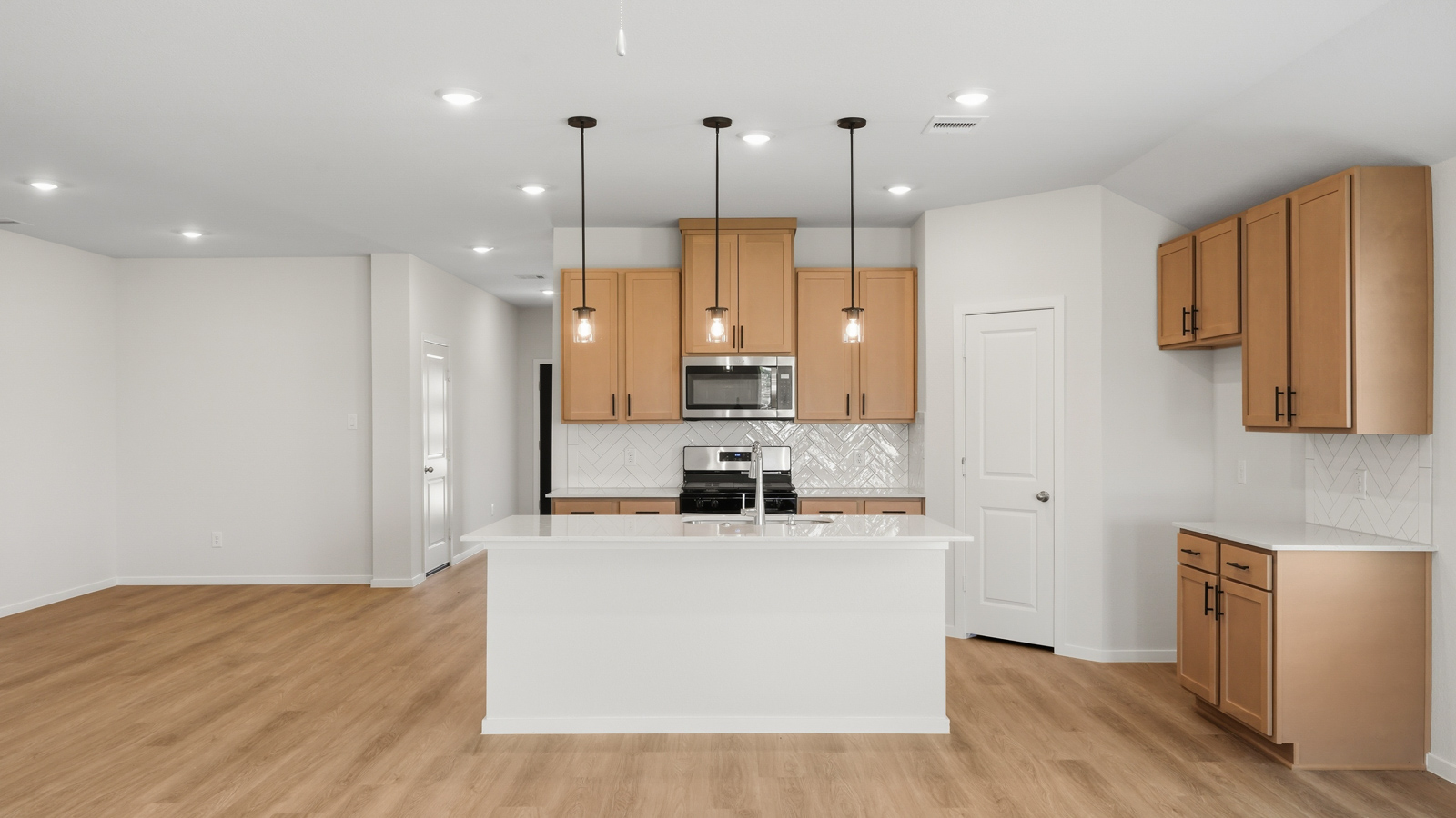 kitchen with quartz countertops and stainless steel appliances