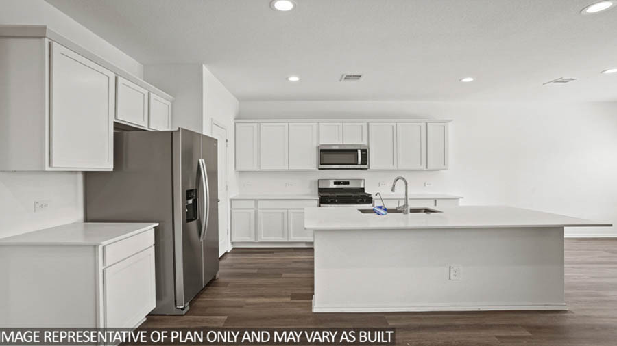 kitchen with stainless steel appliances and quartz countertops