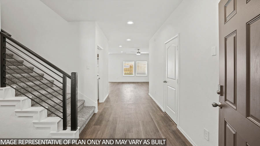 hallway with vinyl flooring
