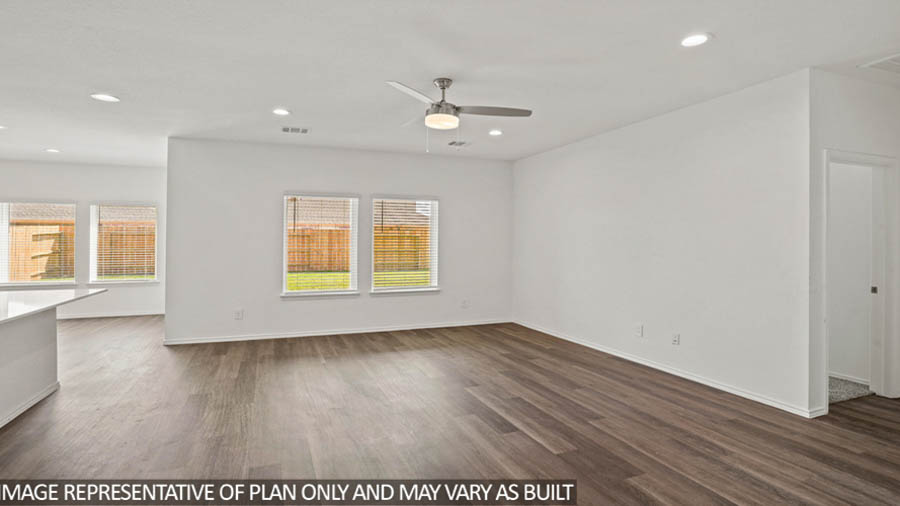 open concept living and dining area with vinyl flooring