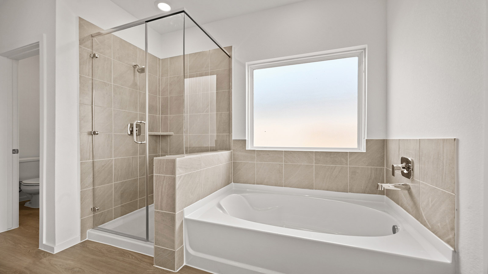 primary bathroom with seperate tub and shower