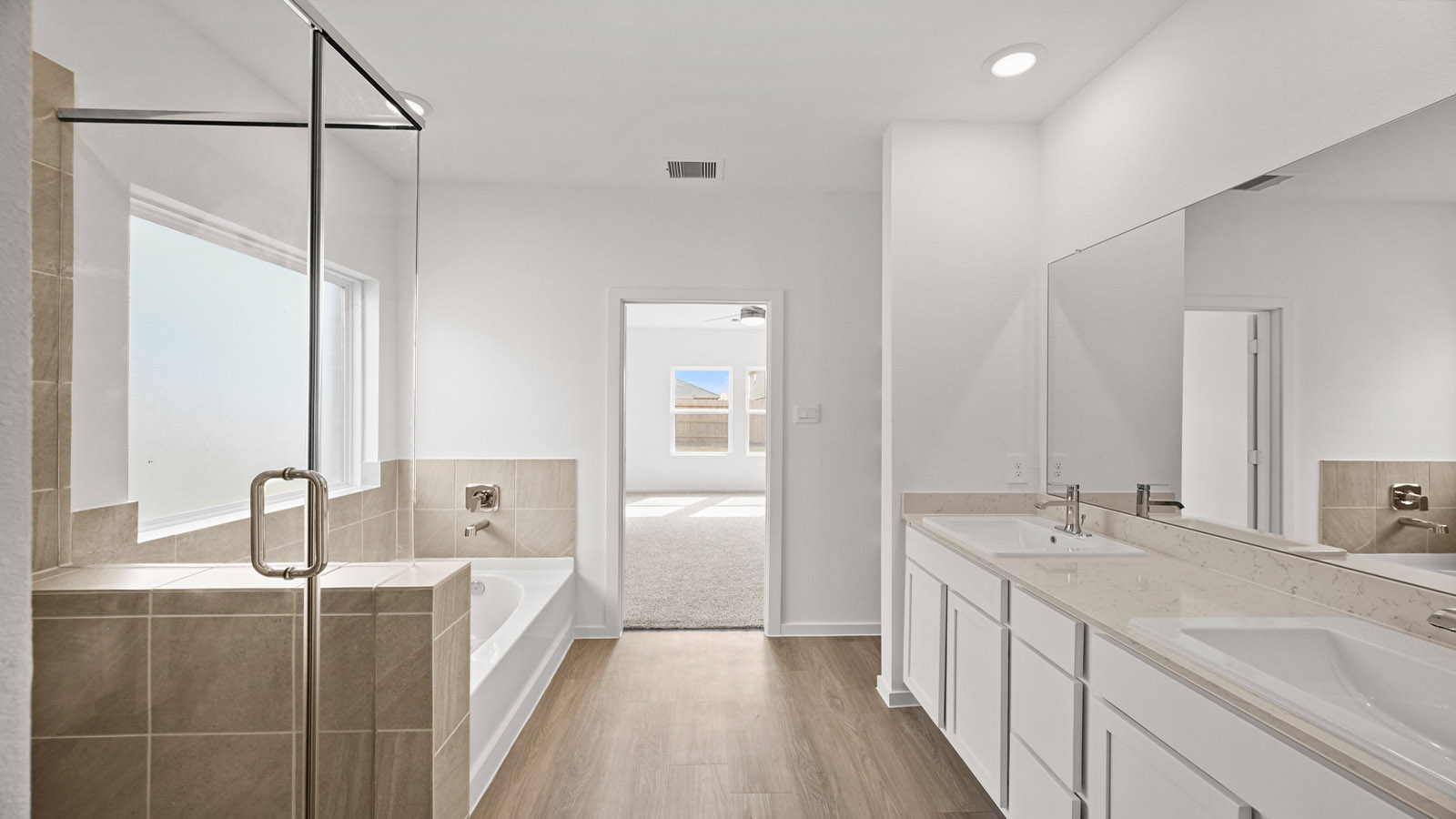 primary bathroom with seperate tub and shower