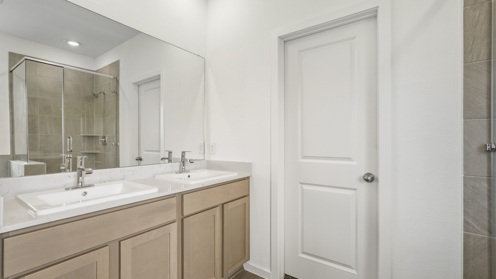 primary bathroom with separate tub and shower