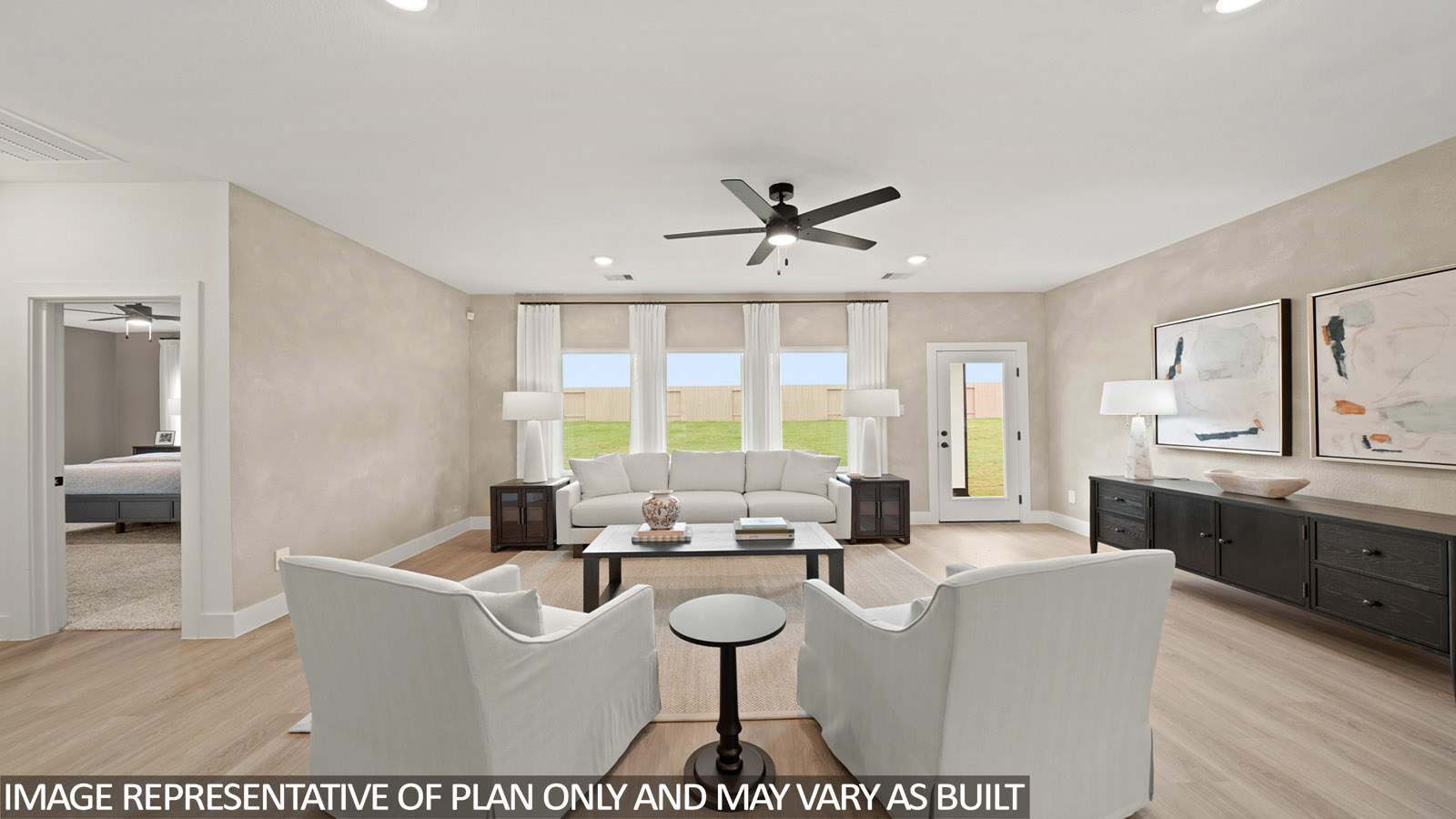 open concept living and dining area with vinyl flooring, quartz countertops, and large windows
