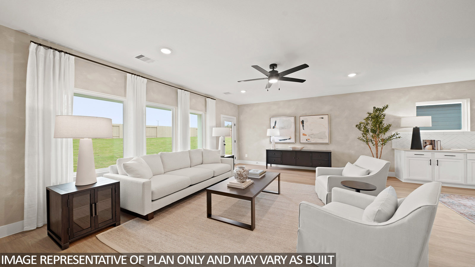 open concept living and dining area with vinyl flooring, quartz countertops, and large windows