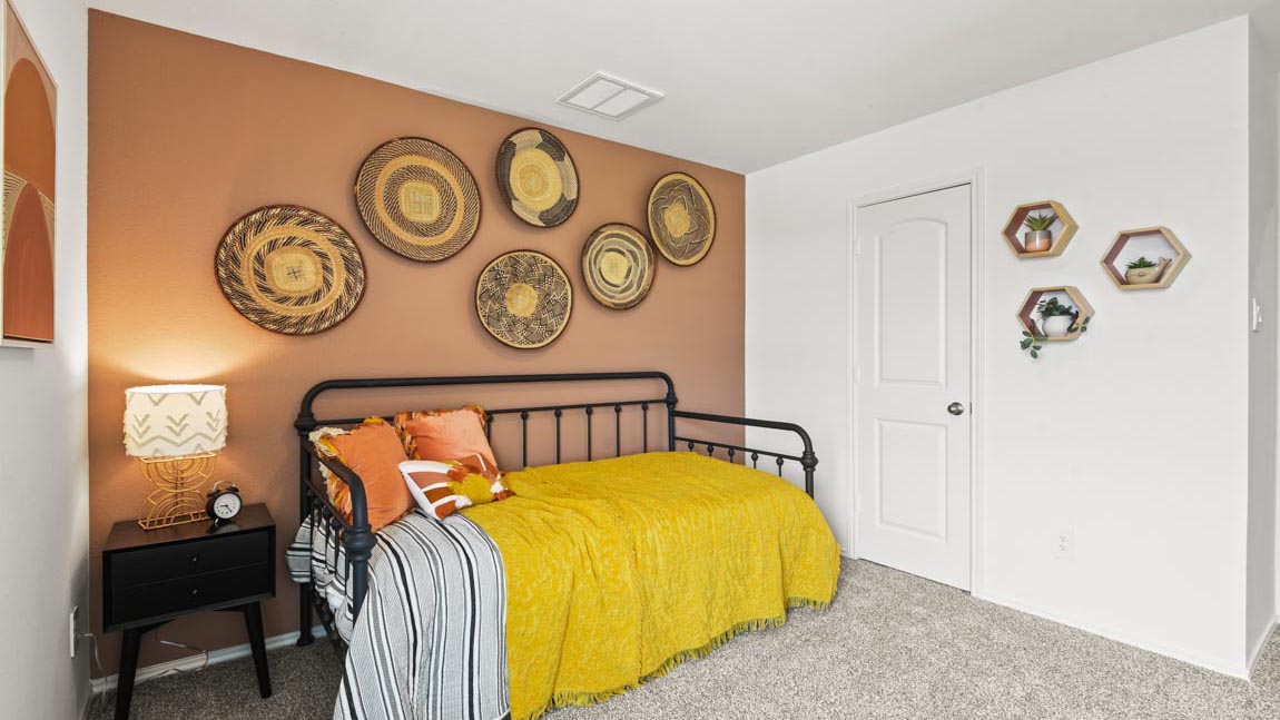 bedroom with capter flooring and window