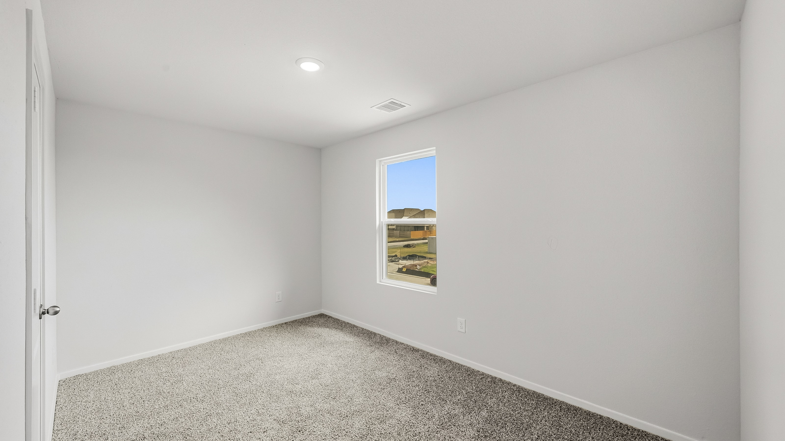 secondary bedroom with carpet flooring in Hockley, TX