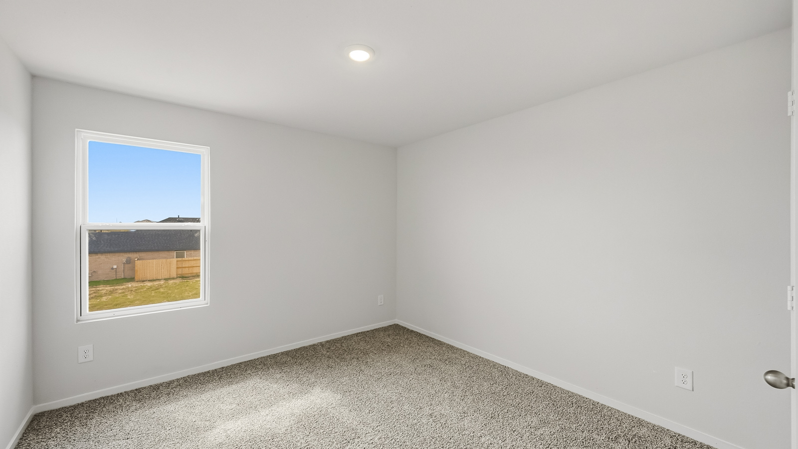 secondary bedroom with carpet flooring in Hockley, TX