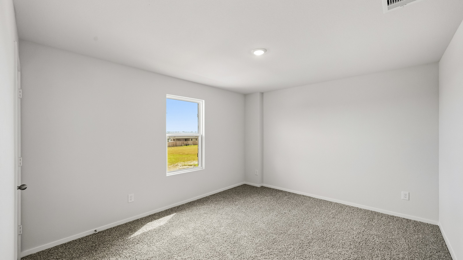 secondary bedroom with carpet flooring in Hockley, TX