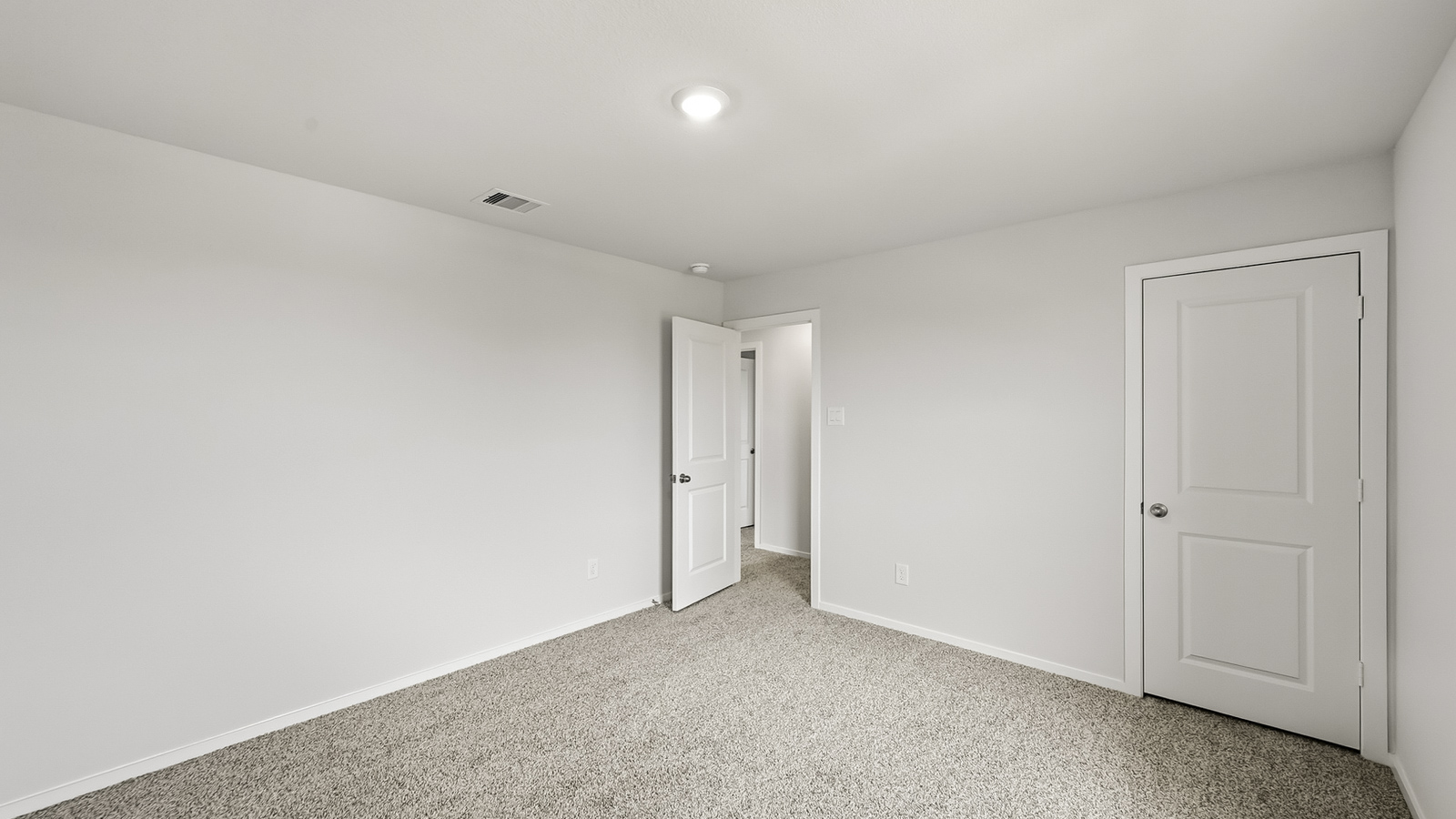 secondary bedroom with carpet flooring in Hockley, TX