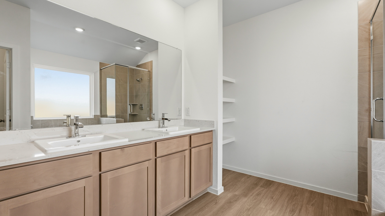primary bathroom with separate tub and shower