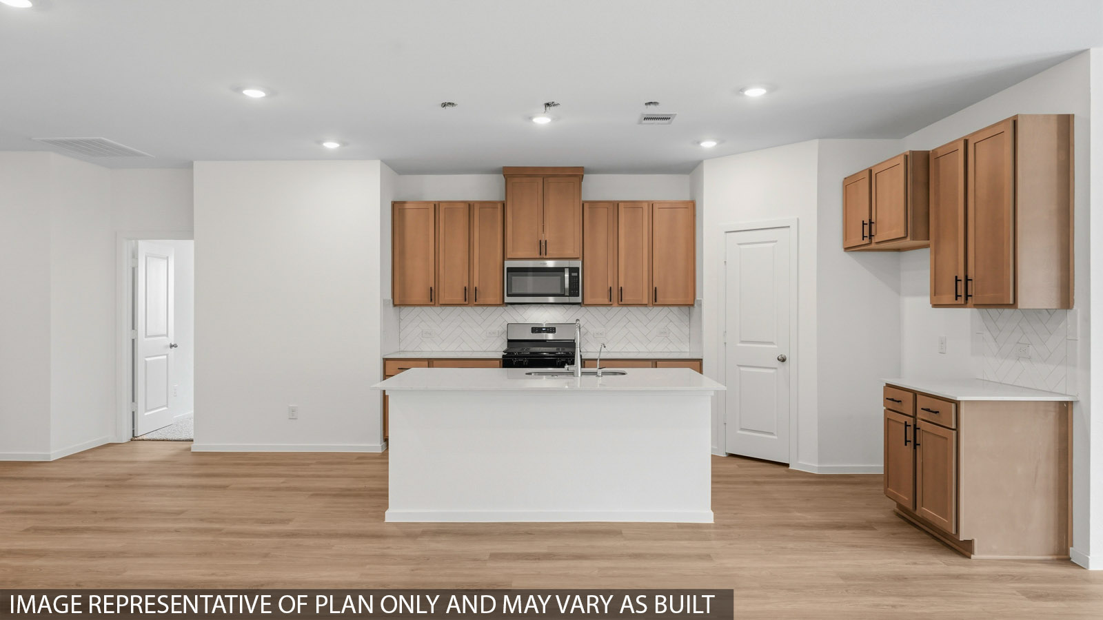 open concept living and dining area with vinyl flooring and large windows